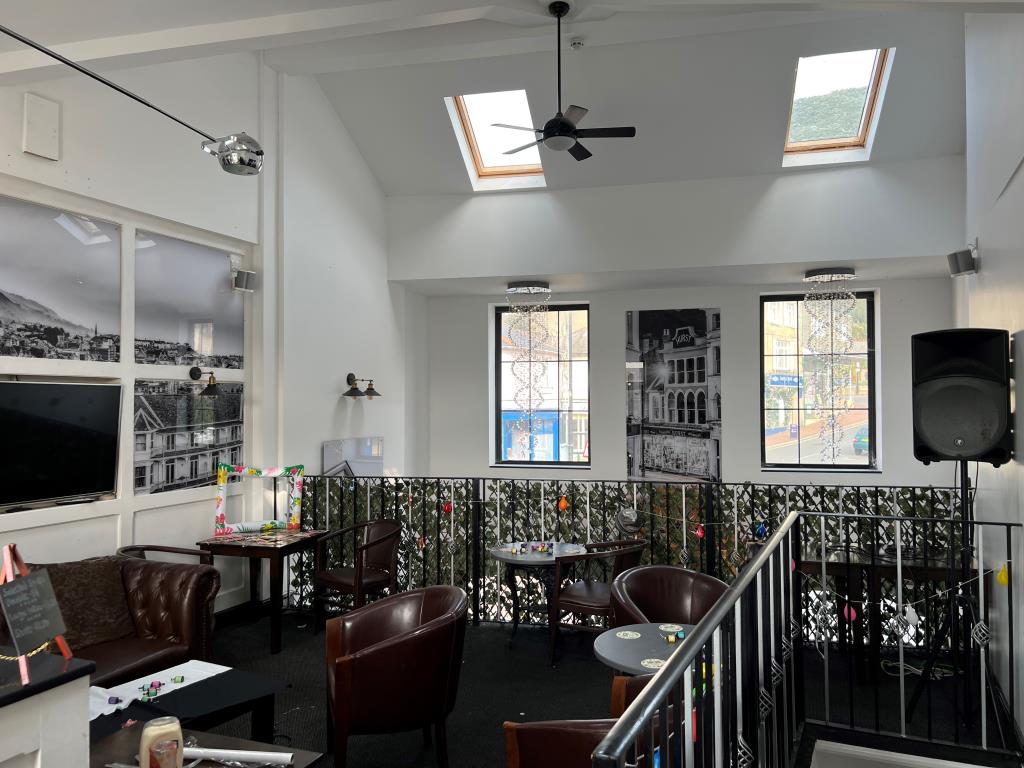 Lot: 79 - TOWN CENTRE FREEHOLD THREE STOREY BAR WITH GARDEN AND PARKING - Part of the first floor seating area